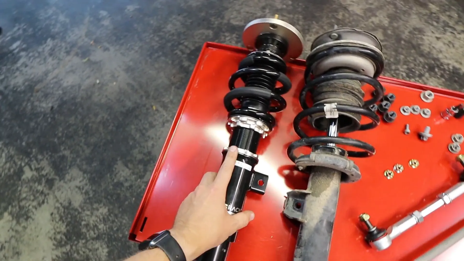 Comparison of stock struts and BC coilovers